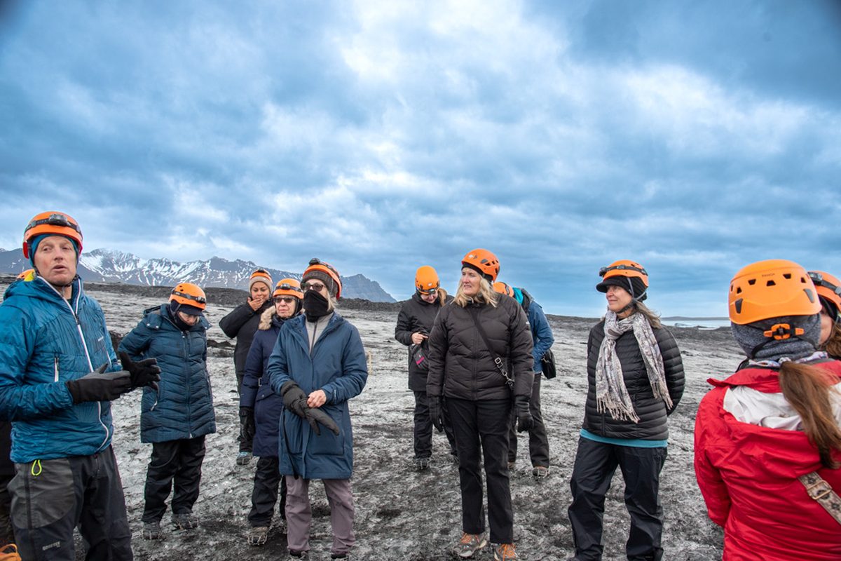 Travelers on the glacier with guide